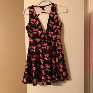 Low cut/ Open back dress